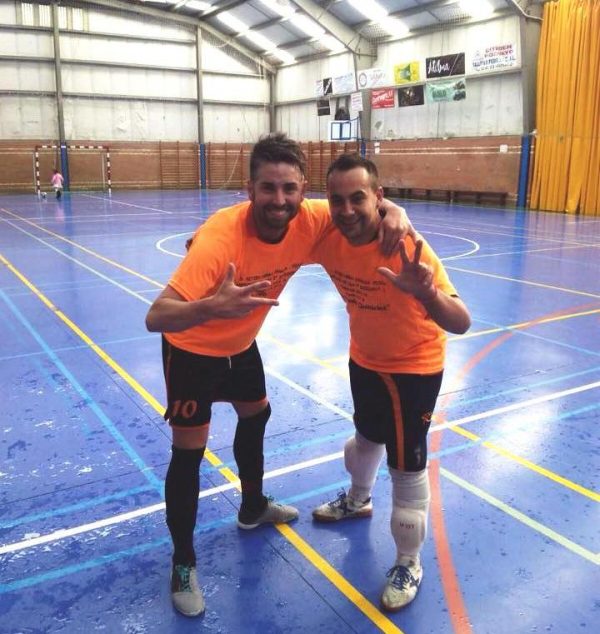 Santos y Martínez tras ganar la liga